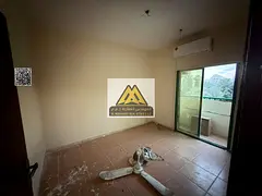 Two-bedroom apartment with living room in Al Nuaimiya 2, Ajman, balcony and large roof, new split AC