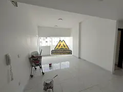 Spacious one-bedroom apartment with a living room, balcony, and built-in wardrobes for annual rent 