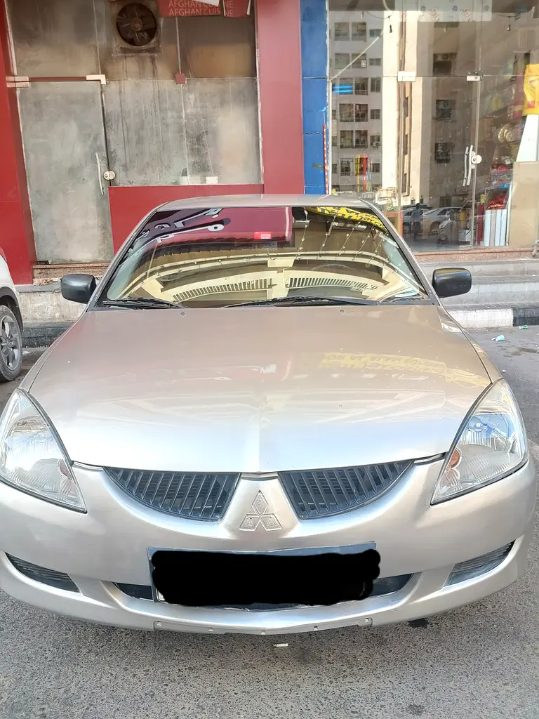 Mitsubishi Lancer EX 2005 — photo 1 of 9