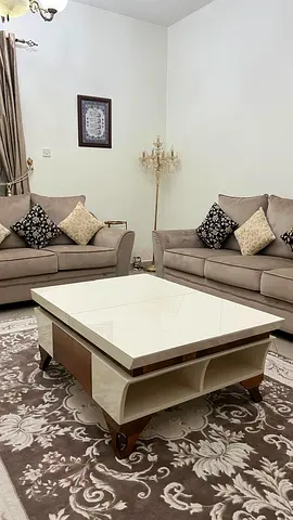 Modern glossy coffee table with storage - beige/wood finish