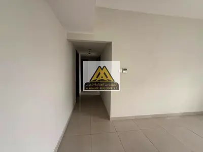 Two-bedroom apartment with hall in Al Jurf 3, 2 bathrooms, balcony, central AC. 39,000 yearly, 3 payments, families only, free maintenance, prime loca