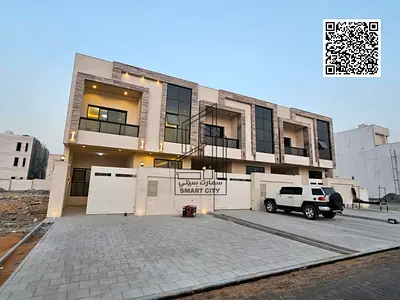 Villa for sale in Ajman, Al Helio area, including registration fees. 5 master bedrooms, majlis, living room, and maid's room. Freehold ownership for a