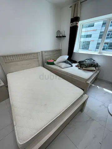 Light wood single bed frame - slatted base, good condition