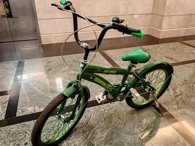 Green kids cruiser bike - single speed, good condition