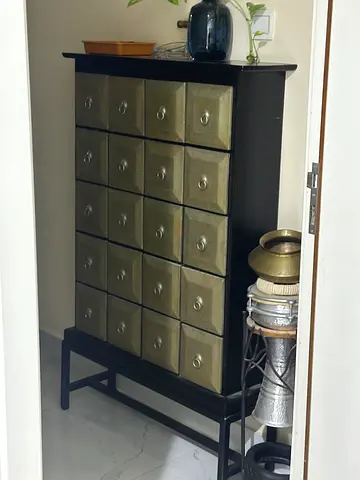 Black Wooden Multi-Drawer Console Cabinet with 20 Brass-Front Drawers
