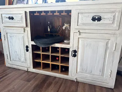 Beautiful handcrafted solid wood wine rack and storage cabinet made by Art  Craft UAE.