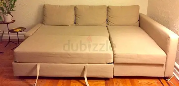 Beige Corner Sofa Bed with Storage — Good Condition