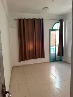 Bachelors room with Attached washroom and kitchen available Near Zulekha hospital Nasriya Sharjah