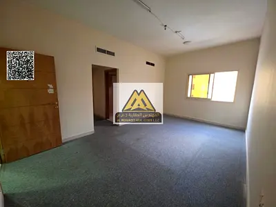 One-bedroom apartment with hall in Al Nuaimiya, Kuwait Street, very spacious, 27,000 yearly, 4 or 6 payments, prime location on main road, close to se