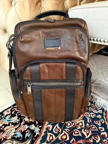 Genuine leather Tumi-style brown backpack - good condition