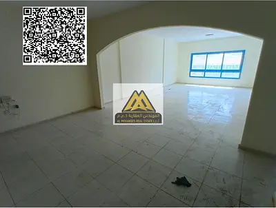 Two-bedroom master bedroom apartment with living room for rent in Al Rumaila 1, Ajman, with maid's room, central air conditioning, and built-in wardro