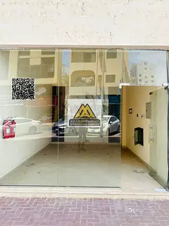 Shop for rent in Al Nakheel 1, second row from Ajman Corniche, prime and lively location with contin