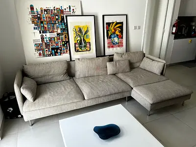 Light grey L-shaped sectional sofa with chaise - modern design
