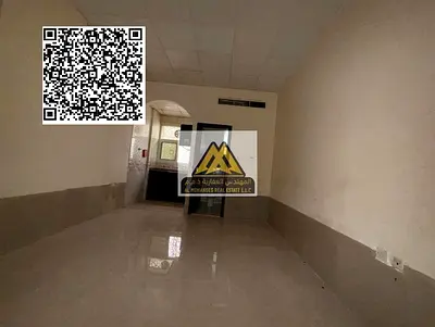 A spacious studio for annual rent in Al Jurf 2 – Ajman, featuring a semi-separated kitchen, nice view, and central AC, located in a prime area near Aj