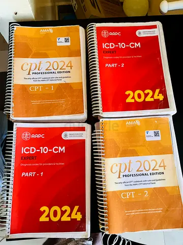 Set of 2024 CPT  ICD-10-CM Spiral Reference Books (Parts 1  2)