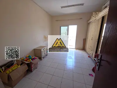 Apartment in Al Rashidiya 3, one bedroom and living room, large space, open view, 28,000 yearly, 4 or 6 payments, prime and lively location, close to
