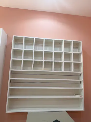 White multi-compartment shelving/display unit — suitable as balloons and ribbon organizer. New