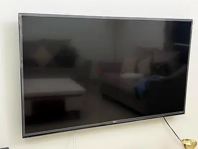 LG 49 LED TV - Wall Mounted, Good Condition