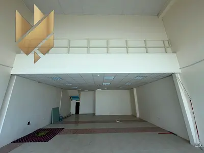 Showroom with an excellent area, high-quality finishes, and a strategic location on a main road in Industrial Area 18, Sharjah.