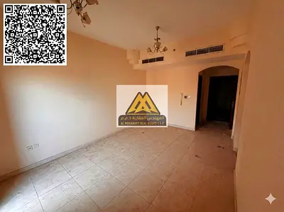 For annual rent: A two-bedroom apartment in Al Nuaimiya 1, Ajman, located near Al Hikma School in a prime location with easy access to Dubai and Sharj