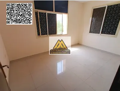 A 1-bedroom apartment with a living room for annual rent in Al Nuaimiya 2 – Ajman, featuring a spacious layout and split AC, located near Sharjah and