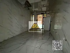 Shops for rent in Al Rashidiya 2, Ajman, in a prime location next to Falcon Towers, within a vibrant