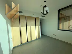 One master bedroom apartment with a spacious living room and private roof, in a prime location in Al