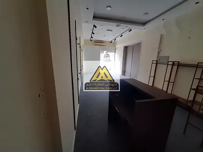 Commercial space for annual rent with mezzanine – Al Rawda 2, Ajman – Sheikh Ammar Street. Prime location and excellent space for commercial activitie