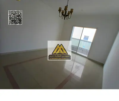 Apartment in Al Rumaila 1, two bedrooms and living room, 3 bathrooms, central AC, second row from Ajman Corniche, 40,000 yearly, 4 payments, close to