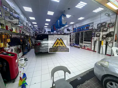 A large car accessories shop with an attached storage room.