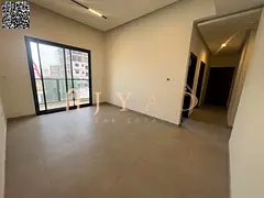 2BR apartment with hall in Al Alia, Ajman. Free month, 2 master bedrooms, built-in wardrobes, centra
