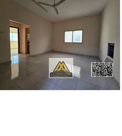 1BHK in Al Alia Ajman, spacious, split AC, balcony, near Sheikh Mohammed Bin Zayed Road. AED 28,000 yearly, 4 installments. Prime location.