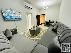 Furnished two-bedroom apartment with a living room for rent in Ajman, clean and tidy furnishings. Lo