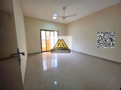 Apartment in Al Nuaimiya with 2 balconies, open view, prime location near Fashion Zone, and easy access to Sharjah and Dubai.
