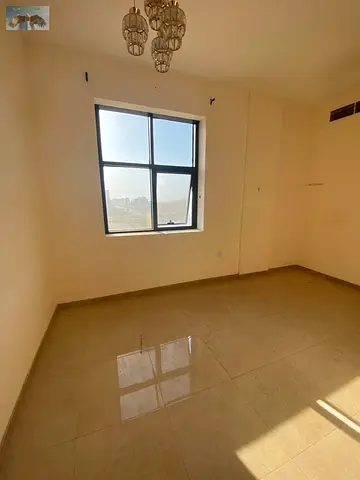 Behind the Chinese market. It consists of two bedrooms, a living room, three bathrooms, a balcony,