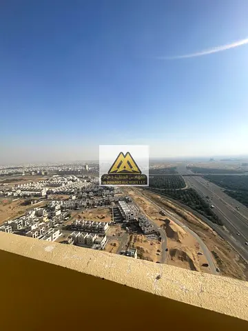 شقة غرفتين وصالة للإيجار في مدينة الإمارات عجمان دور عالي اطلالة مفتوحة موقف سيارة جيم ومسبح برج حديث موقع مميز