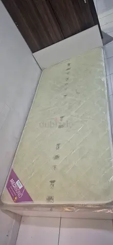 Single mattress in original plastic cover — barely used