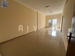First-tenant 2BR apartment with hall in Al Jurf 3, Ajman. 3 baths, balcony, central AC, built-in war