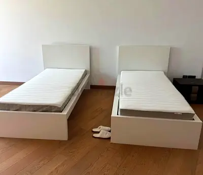 Ikea Two single bed with mattress available in perfect condition