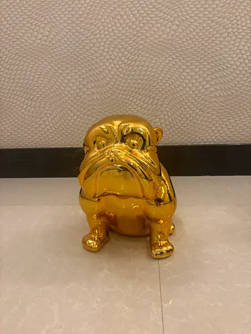 Golden dog statue decor