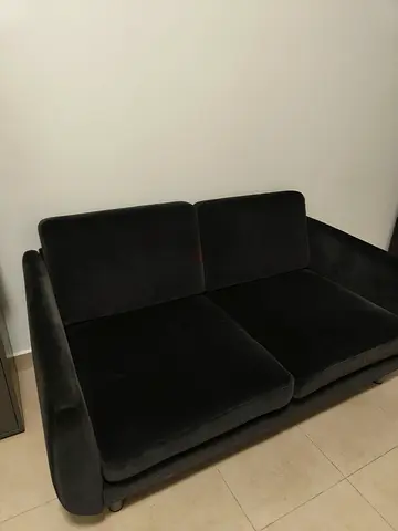 2-seater black velvet sofa in good condition