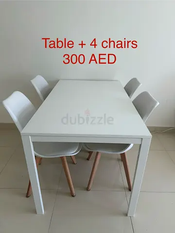 Dinning table + 4 chairs