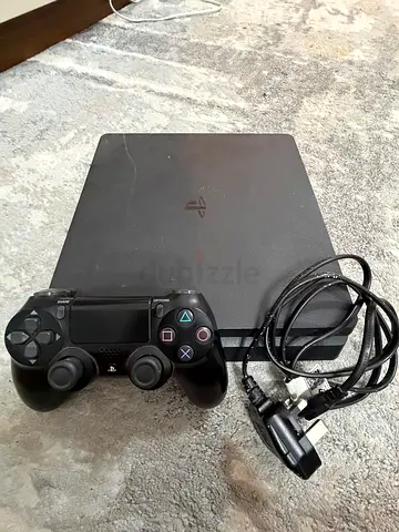 Sony PlayStation 4 Slim with DualShock 4 Controller and Cables - Good Working Condition (NEGOTIABLE)