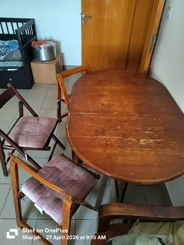 Foldable wooden dining table with 3 chairs
