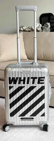 Rimowa off-white wheels carry case