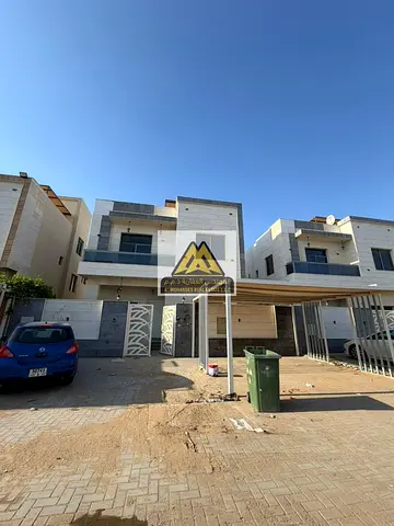 A spacious villa available for rent in Al Yasmeen, located in Al Ittihad Plan on an asphalt road, offering comfortable living in a well-planned reside