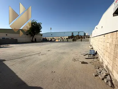 Open Yard for Rent Industrial Area 13 Sharjah Total Area: 10,000 sq. ft. Prime main road location Interlock flooring 54 kW electricity