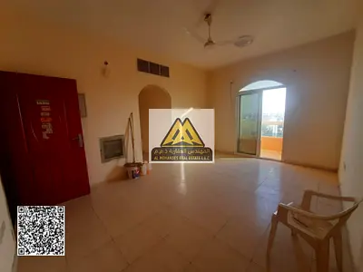 For annual rent: A one-bedroom apartment with a balcony in Al Muwaihat 2, Ajman. This prime location is close to Al Mubarak Market and situated on a m