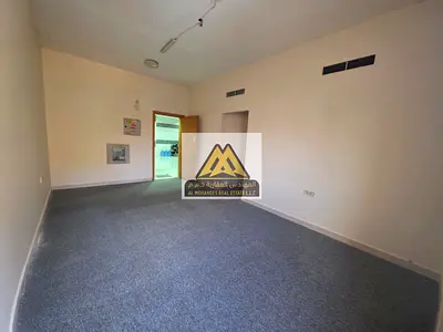 Al Nuaimia. This property is strategically located directly on Kuwait Street, making it an ideal choice for those seeking extra space and comfort in o
