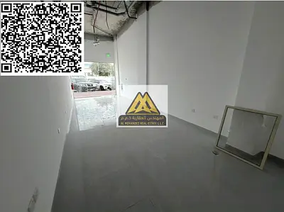 A commercial space for annual rent in a prime location in Al Rawda 2, Ajman, featuring ample space, a reasonable price, and an ideal opportunity to st